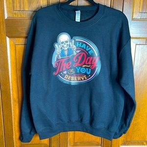 Black Gildan crew neck sweatshirt w/ Halloween theme.